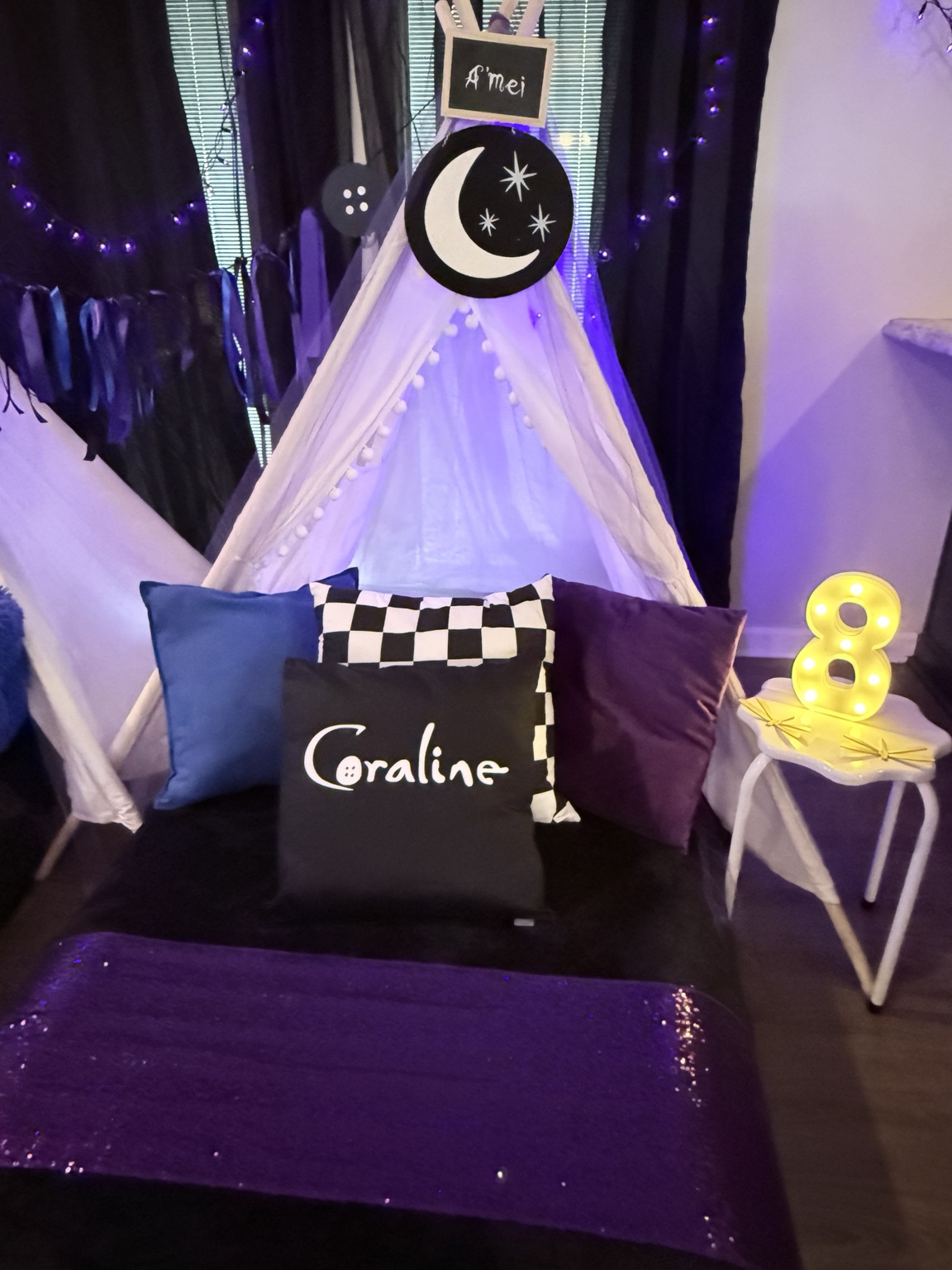 Coraline teepee bed with personalized pillow, purple accents, and number eight light